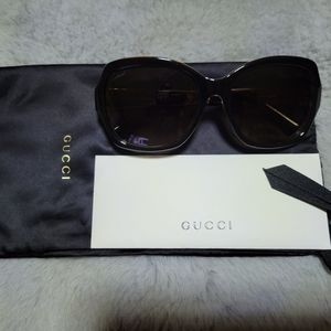 Authentic Black Gucci Sunglasses With Floral pattern inside frame